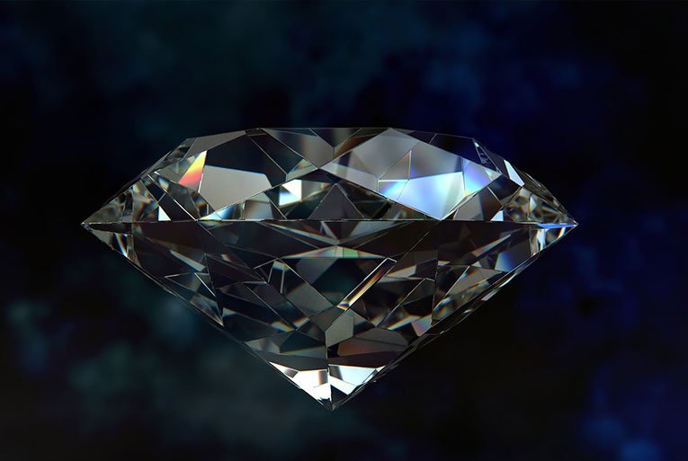 Faceted diamond glittering against a dark blue background