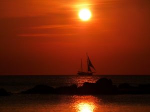 Pirated Word Press Themes article photo of sunset and pirate ship Pirated Word Press Themes photo of pirate ship